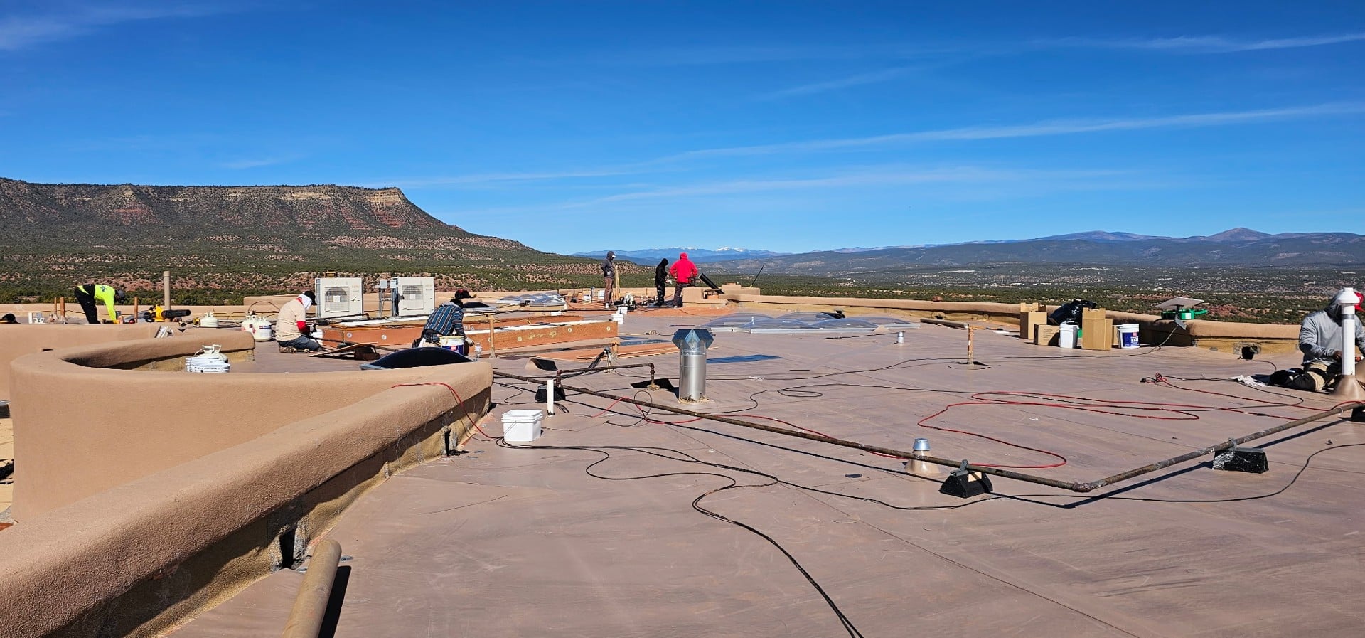 Rooftop with New Mexico mountains in the distance